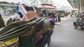 People was pushing cart with fully material in the market, Bangkok Thailand