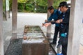 People wash hand and mouth infront of Kotoku-in temple