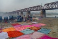 People washing and drying cloth on the sandy banks of Yamuna river, Agra, India Royalty Free Stock Photo