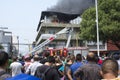 People watch building burn in Manaus