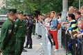 People watch the dress rehearsal of a military parade in honor of Victory Day in Volgograd Royalty Free Stock Photo