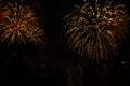 People watch the fireworks. Fourth of July Fireworks. Fireworks light up the sky with dazzling display. glowing fireworks show