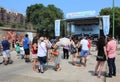 People watch a local band perform at a Latino or Hispanic street food festival in the Pilsen neighborhood in Chicago.