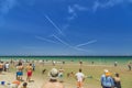 People are watching airshow of jet aircrafts. Royalty Free Stock Photo