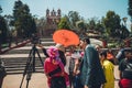 People watching the annular solar eclipse in Mexico with cameras and telescopes