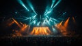 People watching the concert on the stage. Audience facing the stage lit with yellow light