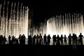 People watching Dubai fountain at night