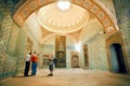 People watching fantastic interior of royal Topkapi palace with colorful tiles, Turkey