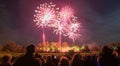 People watching Fireworks display at bonfire 4th of November celebration, Kenilworth Castle, united kingdom. Royalty Free Stock Photo