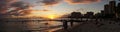 People Watching Golden Sunset Over Waikiki Beach in Oahu, Hawaii Royalty Free Stock Photo