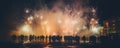 People watching New Year\'s Eve Fireworks in the city center. Firework explosion in the night sky celebrating. Royalty Free Stock Photo