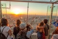 People watching panorama of Paris with Eiffel Tower against colorful sunset in Paris, France Royalty Free Stock Photo