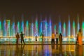 People are watching the Sharjah fountain during evening light and sound show Royalty Free Stock Photo