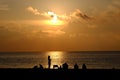 People watching sunrise over the Atlantic Royalty Free Stock Photo
