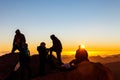 People watching sunrise on the summit of Mount Sinai (Moses Mount) in Egypt Royalty Free Stock Photo