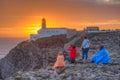 People are watching sunset at Cabo de Sao Vicente in Portugal