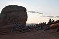 People watching the sunset at Delicate Arch. Arches National Park, Moab, Utah, USA. Royalty Free Stock Photo