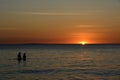 People watching the sunset over the sea on Boracay Island, Philippines