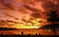 people watching the sunset at seacoast. silhouettes. golden time, Travel and summer concept