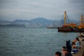 People watching the sunset by the seaside on the streets of Hong Kong Royalty Free Stock Photo