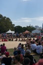 People watching traditional Aboriginal corroboree performance at Yabun festival