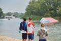 People watching waterskiing