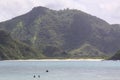 People in water at Mawun beach Lombok, Indonesia