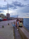 People at waterfront boardwalk, montevideo, uruguay