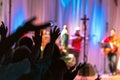 People waving hands at the catholic charismatic renewal Royalty Free Stock Photo