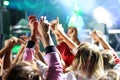 People waving hands at a concert Royalty Free Stock Photo