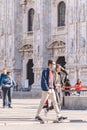 People wear protective masks prevent coronavirus, covid 19 during virus outbreak. Young people walking in center of