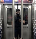 People Wearing Face Mask on the Subway Train during Covid 19 Pandemic in New York City