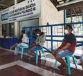 people wearing masks queuing for a swab test for corona virus or covid19