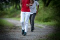 People wearing sport shoes running in the park Royalty Free Stock Photo