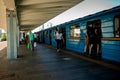 People Wearing Surgical Mask Entering The Train During The Covid-19 Pandemic Royalty Free Stock Photo