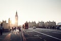 People on Westminster Bridge at sunset, London, UK