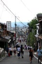 People, which are tourists are pilgrims, are visiting Kyoto in J