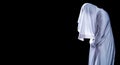 People are in white clothes and appear scary, look like ghost in night  on black background, Halloween Festival concept, Royalty Free Stock Photo
