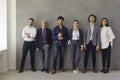 Group portrait of happy successful business professionals standing in office together Royalty Free Stock Photo