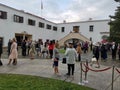 People who enjoy the monarchy day in the courtyard of the Elisabeta Palace Royalty Free Stock Photo