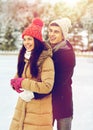 Happy couple ice skating on rink outdoors Royalty Free Stock Photo