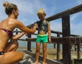 People are wiped with mud. a Mud baths in Spain Royalty Free Stock Photo