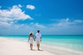 Love sand honeymoon ocean sky travel beach couple vacation people sea summer holiday Royalty Free Stock Photo