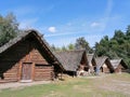 People at wooden medieval buildings