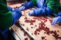 People at work.Unrecognizable workers hands in protective blue g