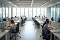 People Working at Desks in Bright Open Office Space Royalty Free Stock Photo