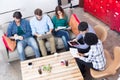 People working office sitting sofa using phone tablet computer