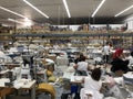 People working in a sewing department of textile factory