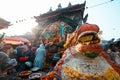People worshipping Kaal Bhairav Statue. Ancient Temples at Kathmandu Durbar Square