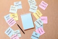 People write down an important note, using on the paper stickers post it Royalty Free Stock Photo